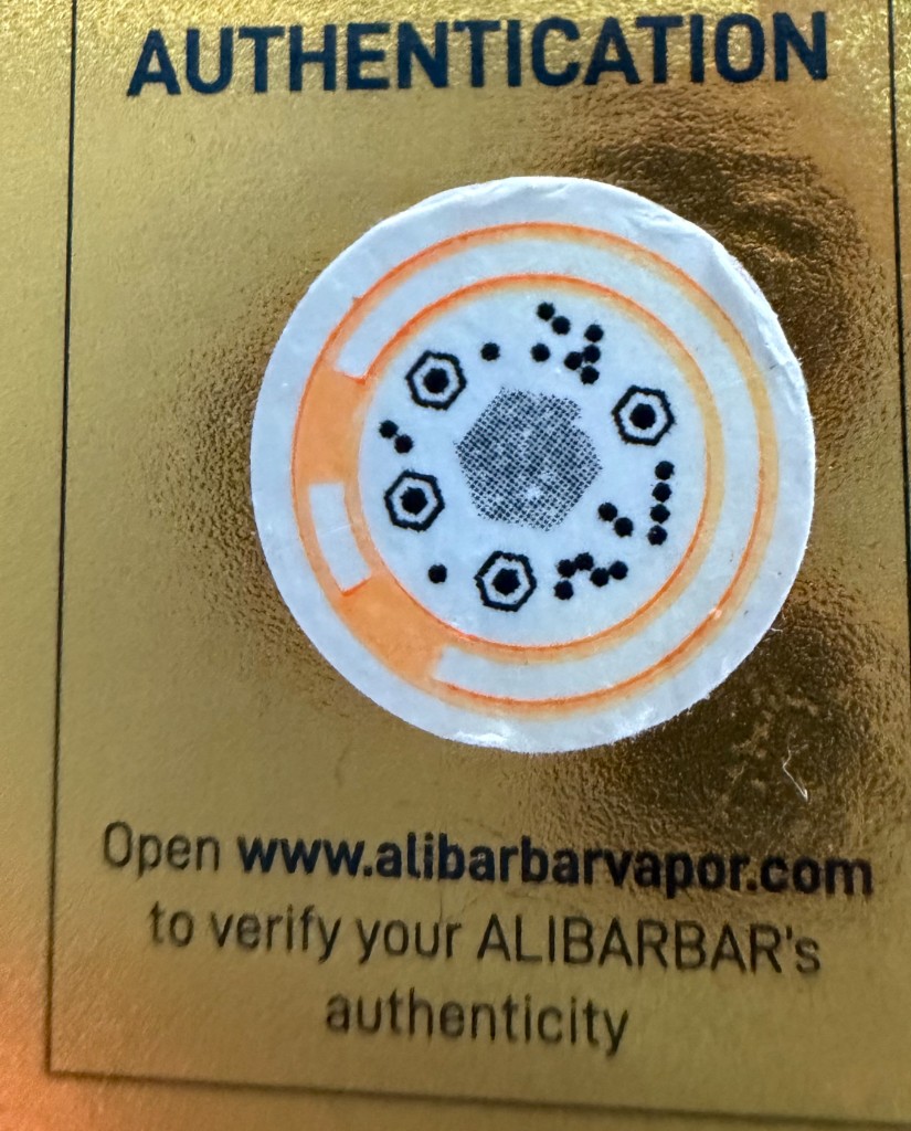 Close-up of the authentication label printed on Alibarbar Ingot 9000 packaging